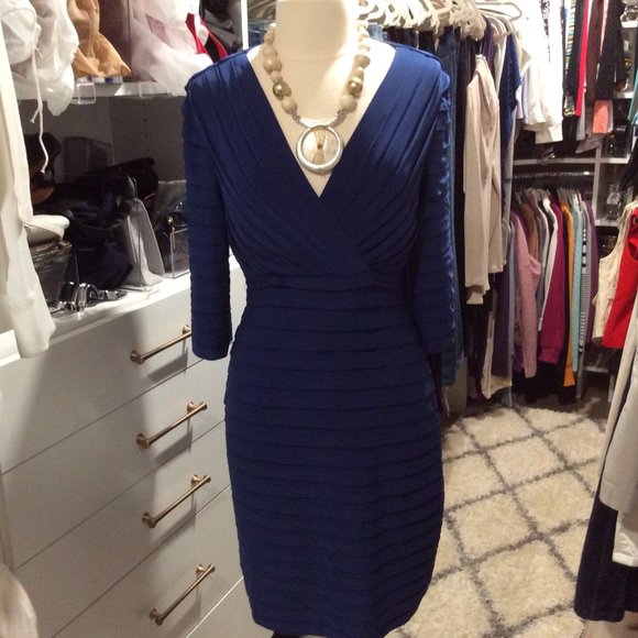 Bloomingdale's Dresses & Skirts - Stretchy blue dress with 3/4 length sleeves.